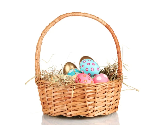 Colorful Easter eggs in the basket isolated on white — Stock Photo, Image