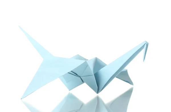 Origami kraan uit de blauwe papier geïsoleerd op wit — Stockfoto
