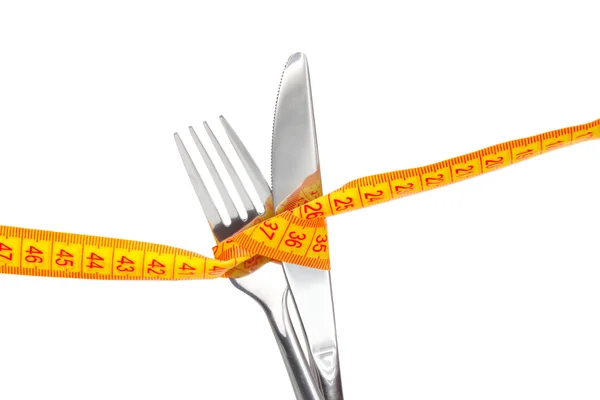 Tenedor, cuchillo y cinta métrica aislados en blanco — Foto de Stock