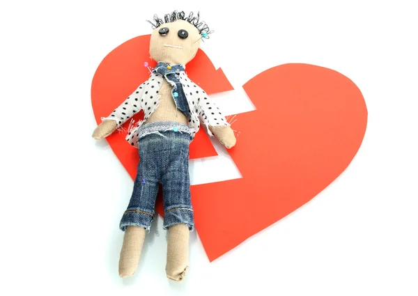 Voodoo doll boy on the broken heart isolated on white — Stock Photo, Image