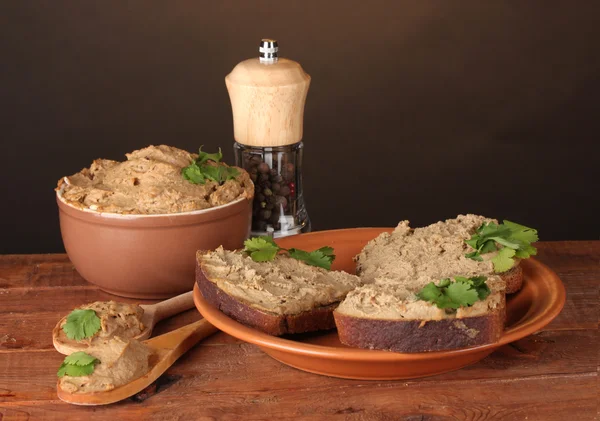 stock image Fresh pate with bread on wooden table