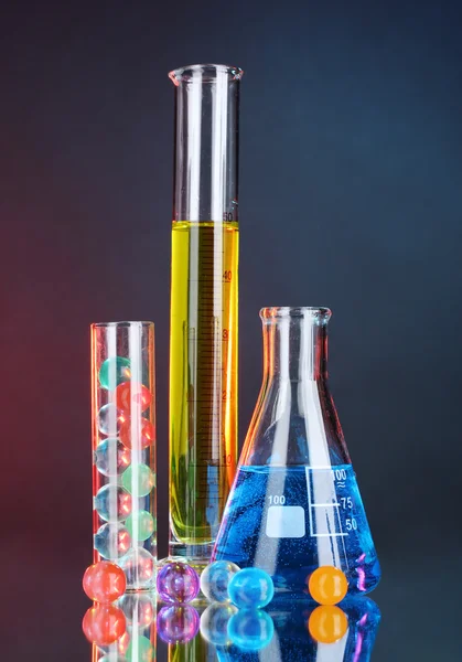 stock image Test-tubes on blue-red background