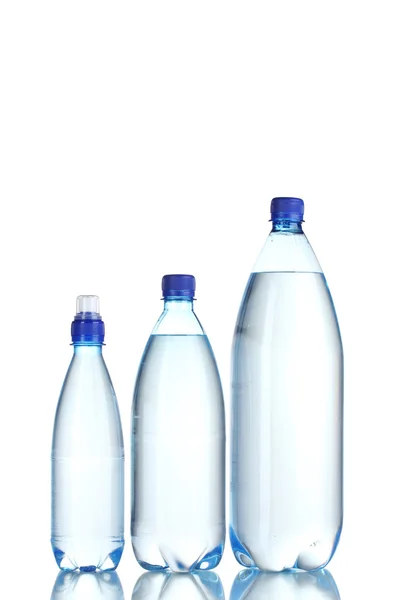 Group plastic bottles of water isolated on white — Stock Photo, Image