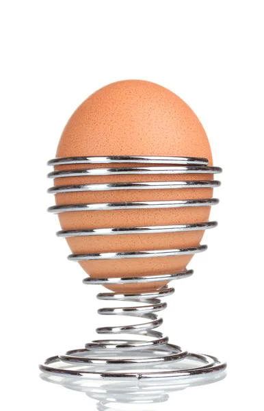 Boiled egg in metal stand isolated on white — Stock Photo, Image