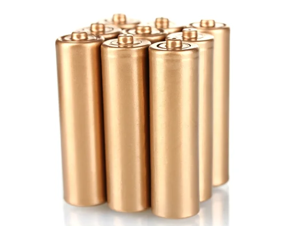Baterías de oro aisladas en blanco — Foto de Stock