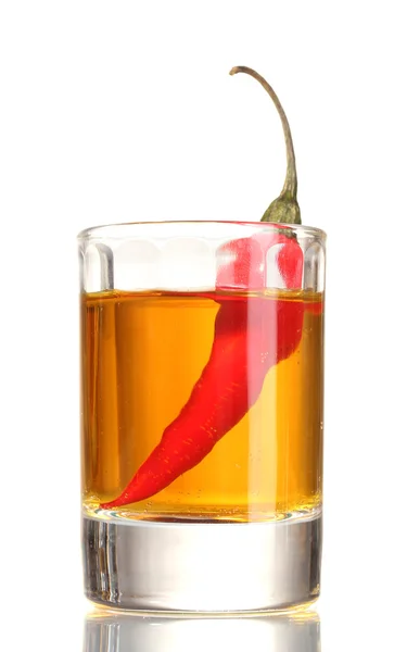 Glass of pepper vodka and red chili pepper isolated on white — Stock Photo, Image