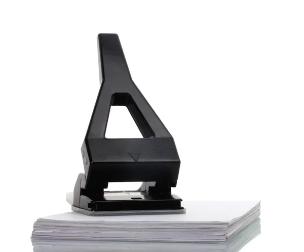 Foro nero ufficio pugno con carta isolata su bianco — Foto Stock