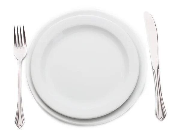 Witte lege plaat met vork en mes geïsoleerd op wit — Stockfoto