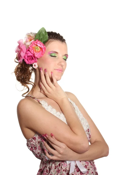 Hermosa chica con flores en el pelo aislado en blanco — Foto de Stock