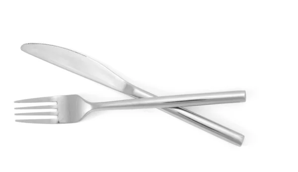 Срібна виделка і ніж ізольовані на білому — стокове фото