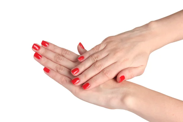 Kobiece ręce z manicure na białym tle — Zdjęcie stockowe