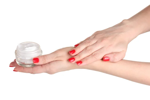Mãos femininas com creme de retenção de manicure isolado em branco — Fotografia de Stock