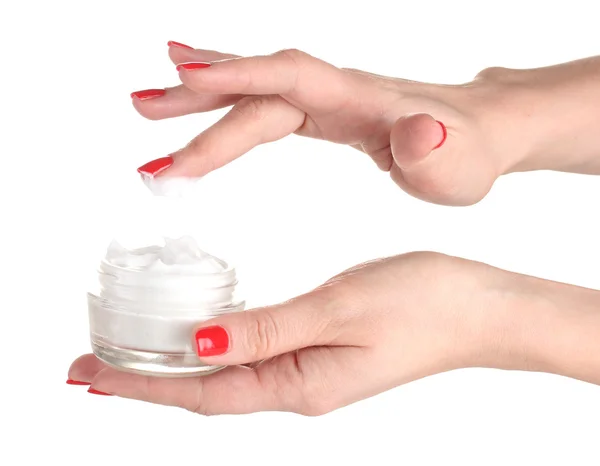 Vrouwelijke handen met manicure houden crème geïsoleerd op wit — Stockfoto