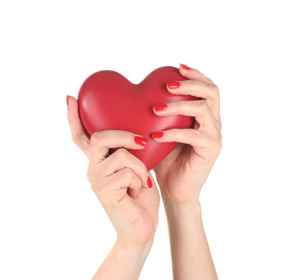 Coração vermelho na mão das mulheres isolado no branco — Fotografia de Stock