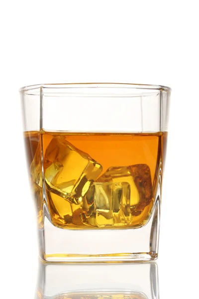 Glass of scotch whiskey and ice isolated on white — Stock Photo, Image