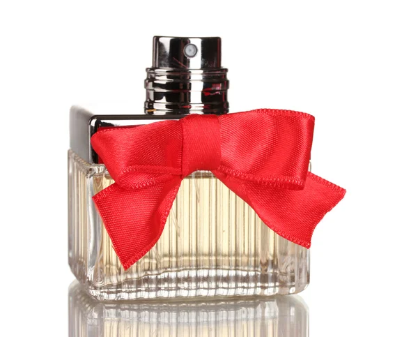 Parfumfles met rode strik geïsoleerd op wit — Stockfoto
