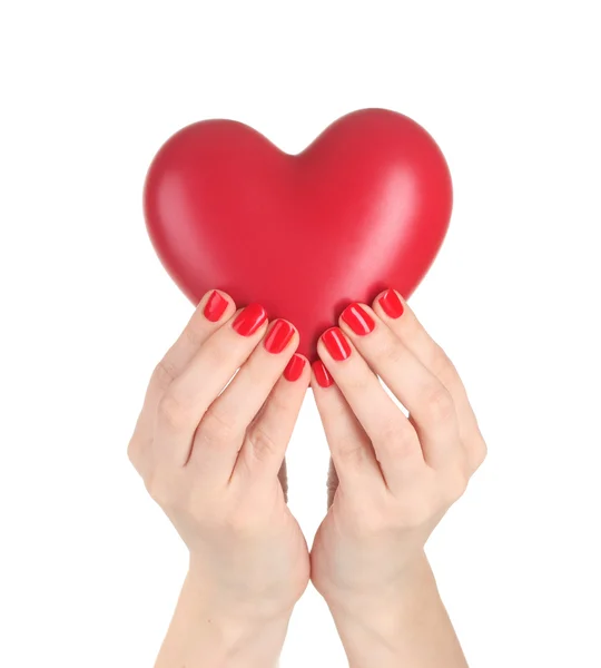 Czerwone serce w womans ręce na białym tle — Zdjęcie stockowe