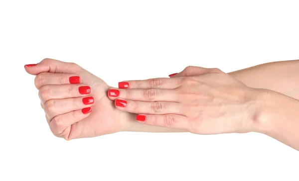 Vrouwelijke handen met manicure geïsoleerd op wit — Stockfoto