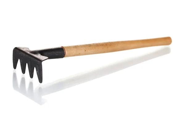 Garden rake isolated on white — Stock Photo, Image