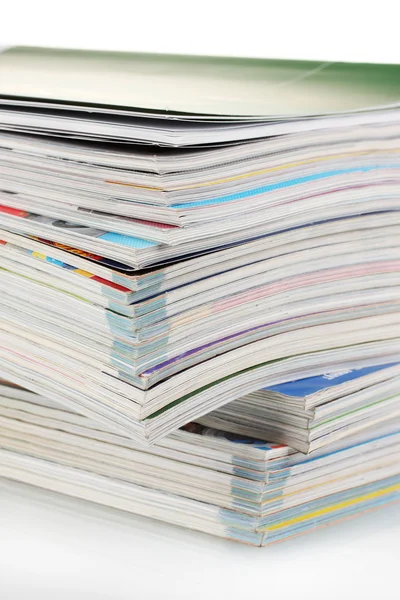 Pila de revistas aisladas en blanco — Foto de Stock