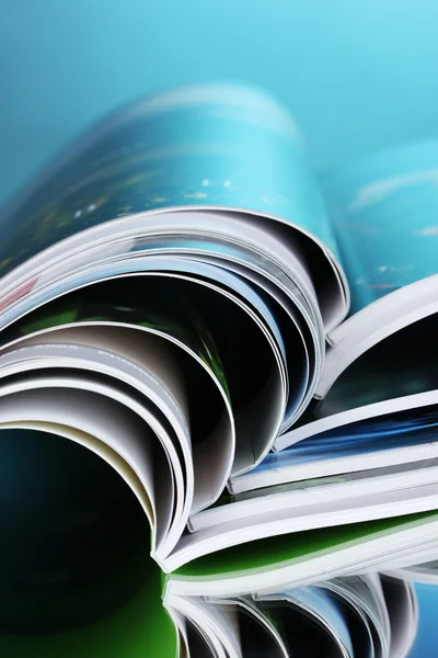 Magazine on blue background — Stock Photo, Image
