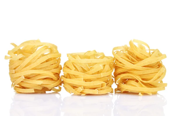 Tasty noodles isolated on white — Stock Photo, Image