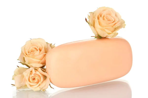 Mýdlo s růží na bílém pozadí — Stock fotografie
