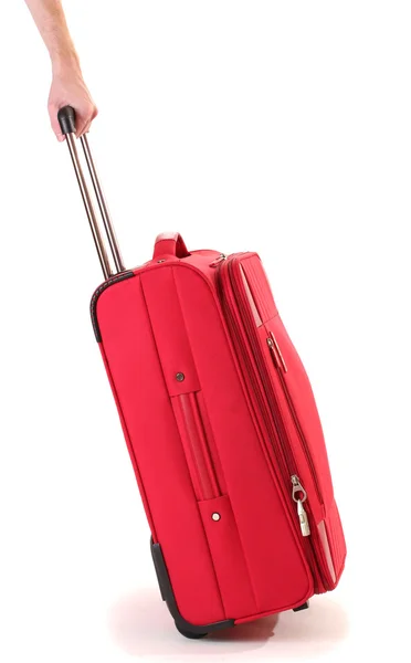 Valigia rossa isolata su un bianco — Foto Stock