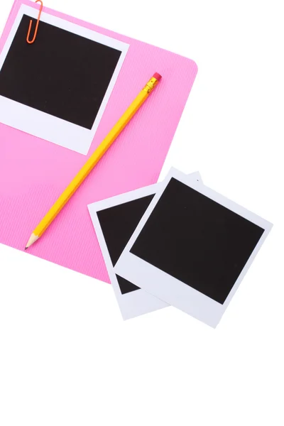 Foto papíry a růžový notebook izolované na bílém — Stock fotografie