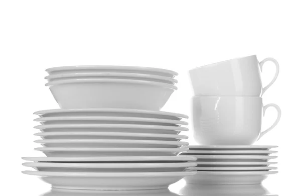 Üres tálak, tányérok és csészék, elszigetelt fehér — Stock Fotó
