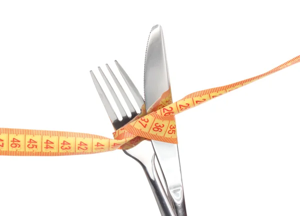 Tenedor, cuchillo y cinta métrica aislados en blanco —  Fotos de Stock