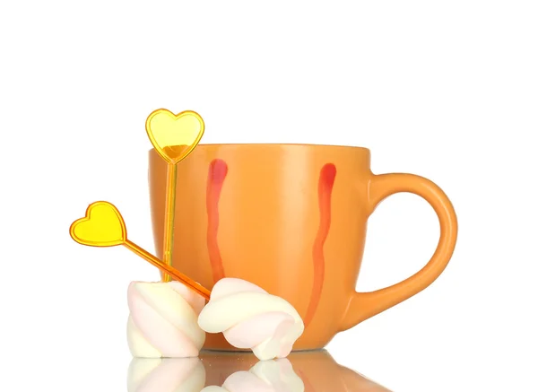 Bonbony dva špejle a pohár izolovaných na bílém — Stock fotografie
