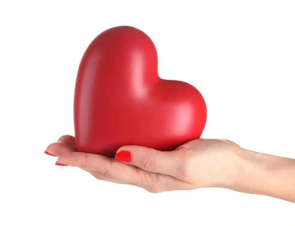 Corazón rojo en la mano de la mujer aislado en blanco — Foto de Stock