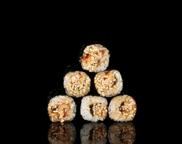 stock image Tasty rolls isolated on black