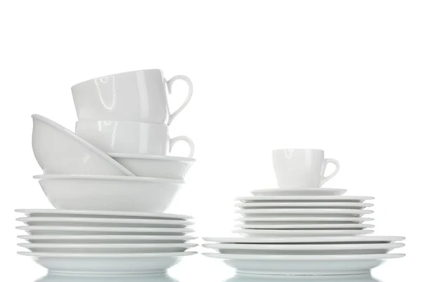 Taças vazias, pratos e copos isolados sobre branco — Fotografia de Stock