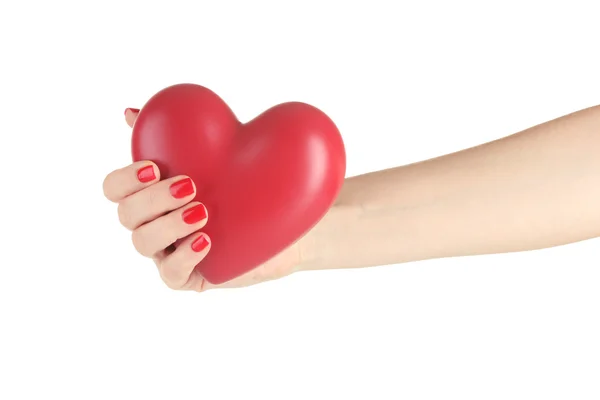 Czerwone serce w womans ręcznie na białym tle — Zdjęcie stockowe