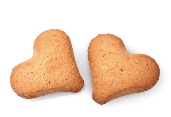 Dois biscoitos em forma de coração isolados em branco — Fotografia de Stock