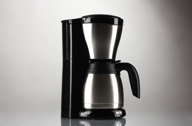 Coffee maker on grey background clipart