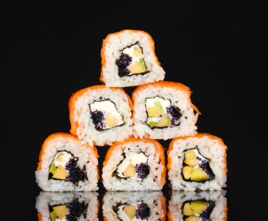 Tasty rolls isolated on black clipart