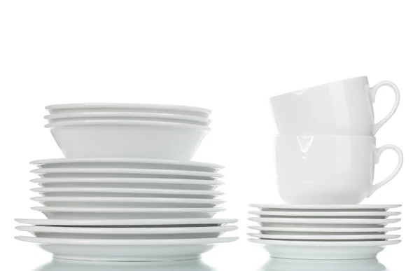 Lege kommen, borden en kopjes geïsoleerd op wit — Stockfoto