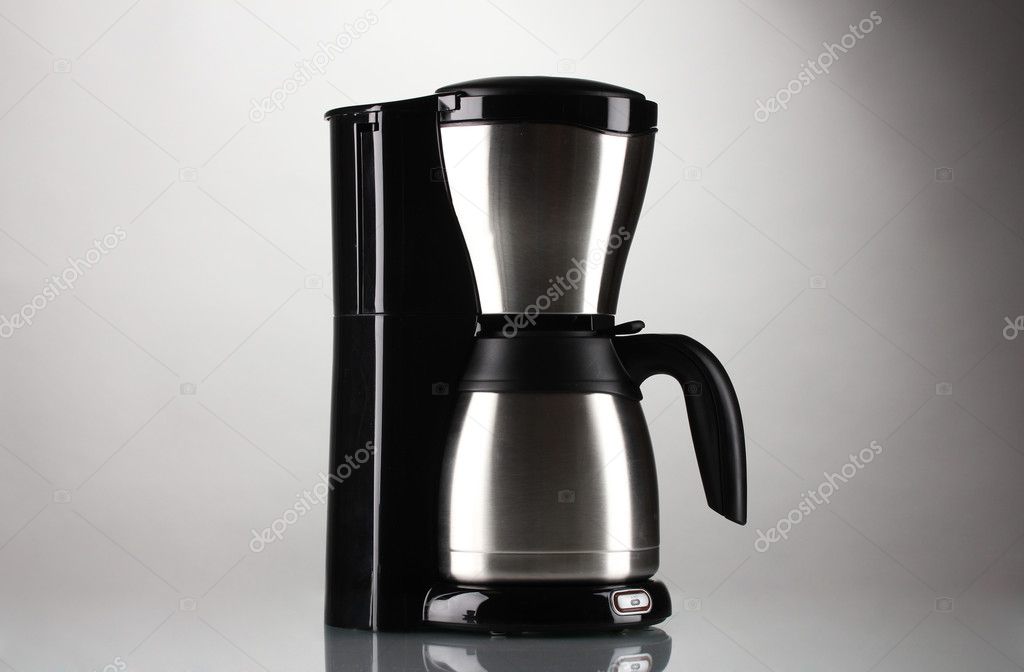 Coffee maker on grey background