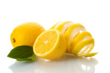 Ripe lemons with leaves isolated on white clipart