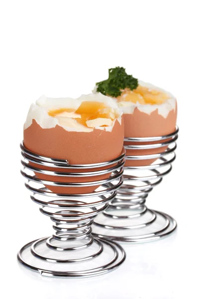 stock image Boiled eggs in metal stands and parsley isolated on white