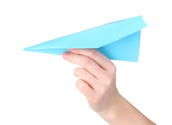 白で隔離される手で折り紙の紙飛行機 — ストック写真