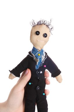 Voodoo doll boy-groom in the hands of women isolated on white clipart