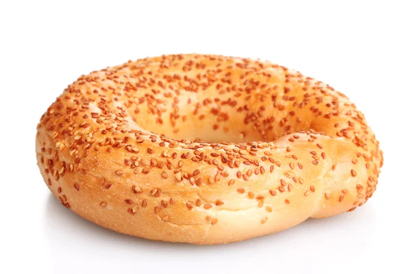 Delicious bagel with sesame seeds isolated on white — Stock Photo, Image