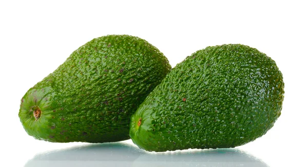 Due frutti di avocado maturi isolati su bianco — Foto Stock