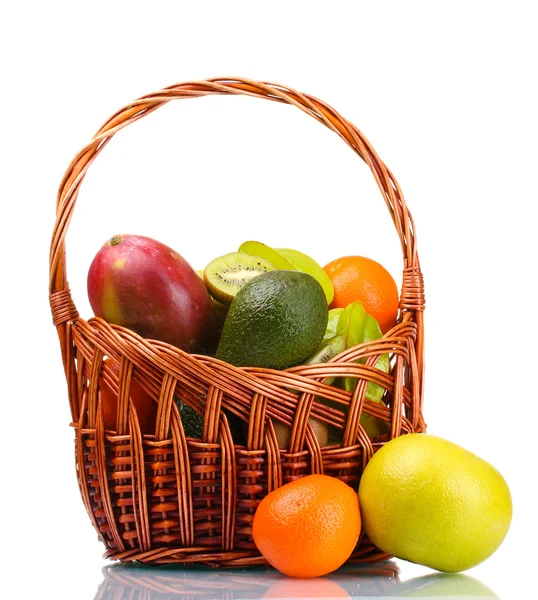 stock image Assortment of exotic fruits in basket isolated on white