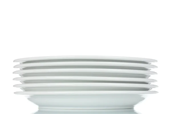 Empty plates isolated on white — Stock Photo, Image