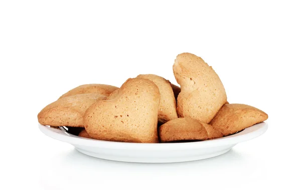 stock image Heart-shaped cookies on white plate isolated on white